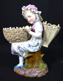 A KPM PORCELAIN FIGURINE, LITTLE GIRL LWITH TWO BASKETS, W GERMANY,