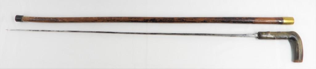 WOODEN SWORD CANE WITH SOLINGEN STEEL BLADE: WOODEN SWORD CANE WITH GERMAN SOLINGEN STEEL BLADE&nbsp; DIMENSIONS TOTAL: Length 35 inch / 89 cmDIMENSIONS BLADE: Length 27.90 inch / 71 cm Shipping: Basel Auction House will refer local third-party