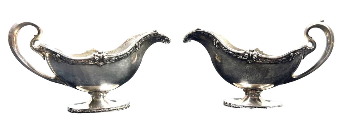 A pair of  sterling silver sauce boats with acanthus handles and   engraved design. (1 of 11)