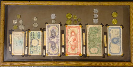 Framed Vintage A collection of foreign banknotes and coins