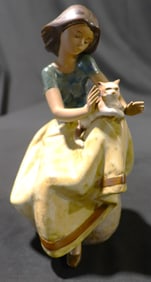 Lladro,Figurine Girl with Cat, model number 2169.