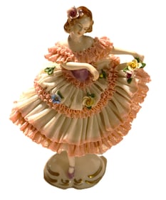 Dresden lace porcelain figurine of a ballerina.