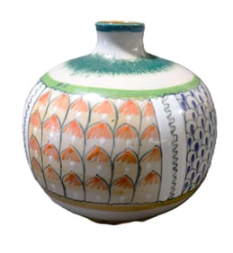 This is an Erandi Tonala Mexican folk art pottery vase.