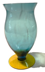 Vintage Bohemian Czech glass footed vase with a blue body and a yellow/amber base.