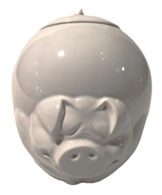 Vintage white ceramic pig cookie jar, possibly a McCoy Quigley Pig Cookie Jar.