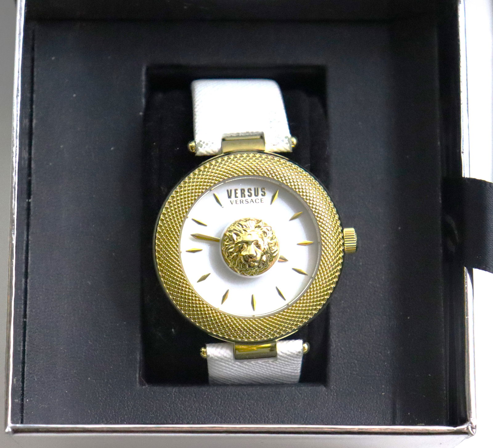 Versus Versace Brick Lane women's watch:  Versus Versace Brick Lane women's watch, specifically the model VSP213818. It features a distinctive lion head emblem at the center o