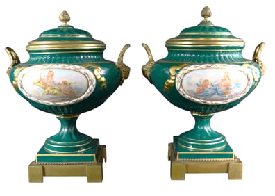A PAIR OF ORMOLU AND GREEN SEVRES STYLE PORCELAIN URN WITH COVER