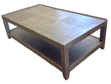 Large rectangular wooden coffee table with two shelves and a panel design on the top surface.