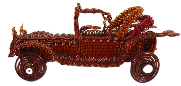 Vintage handmade copper wire sculpture of a vintage-style automobile.