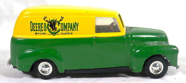 Vintage ERTL 1950 Chevrolet Panel Delivery Truck coin bank in John Deere green and yellow livery.
