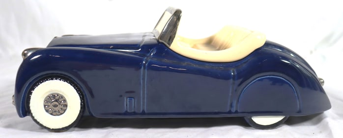 Vintage ceramic car a blue Jaguar XK series (XK120 or XK140) Convertible and a white interior