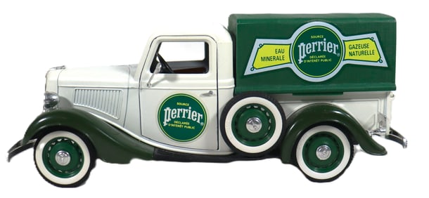 Vintage  Solido 1:19 scale diecast model of a 1936 Ford V8 Pick Up truck with Perrier advertising