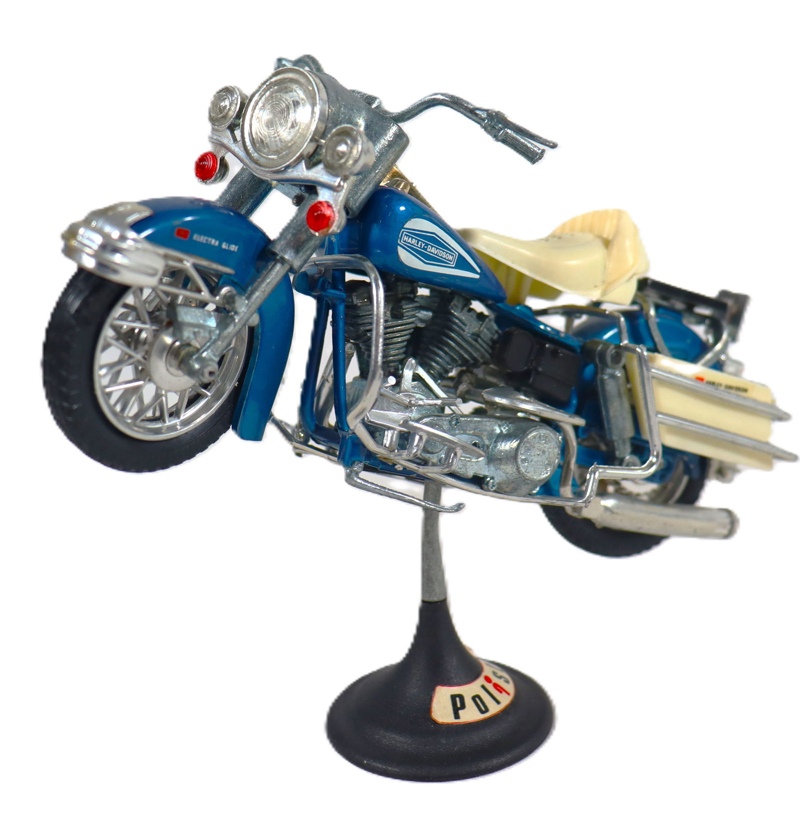 Vintage Polistil Harley-Davidson Electra Glide 1200 scale model motorcycle.: Vintage Polistil Harley-Davidson Electra Glide 1200 scale model motorcycle. It is a die-cast model, typically in 1:15 scale. The model is blue with a white seat. It is a vintage collectible