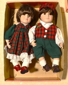 Vintage Brinn's "Jimmy and Missy" porcelain dolls manufactured in 1991 in China.