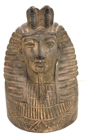 A wooden collectible bust of the ancient Egyptian pharaoh Tutankhamun