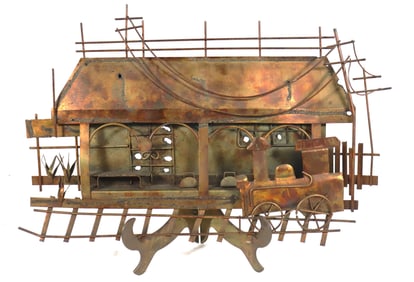 Vintage copper sculpture depicting a railroad and train station scene.