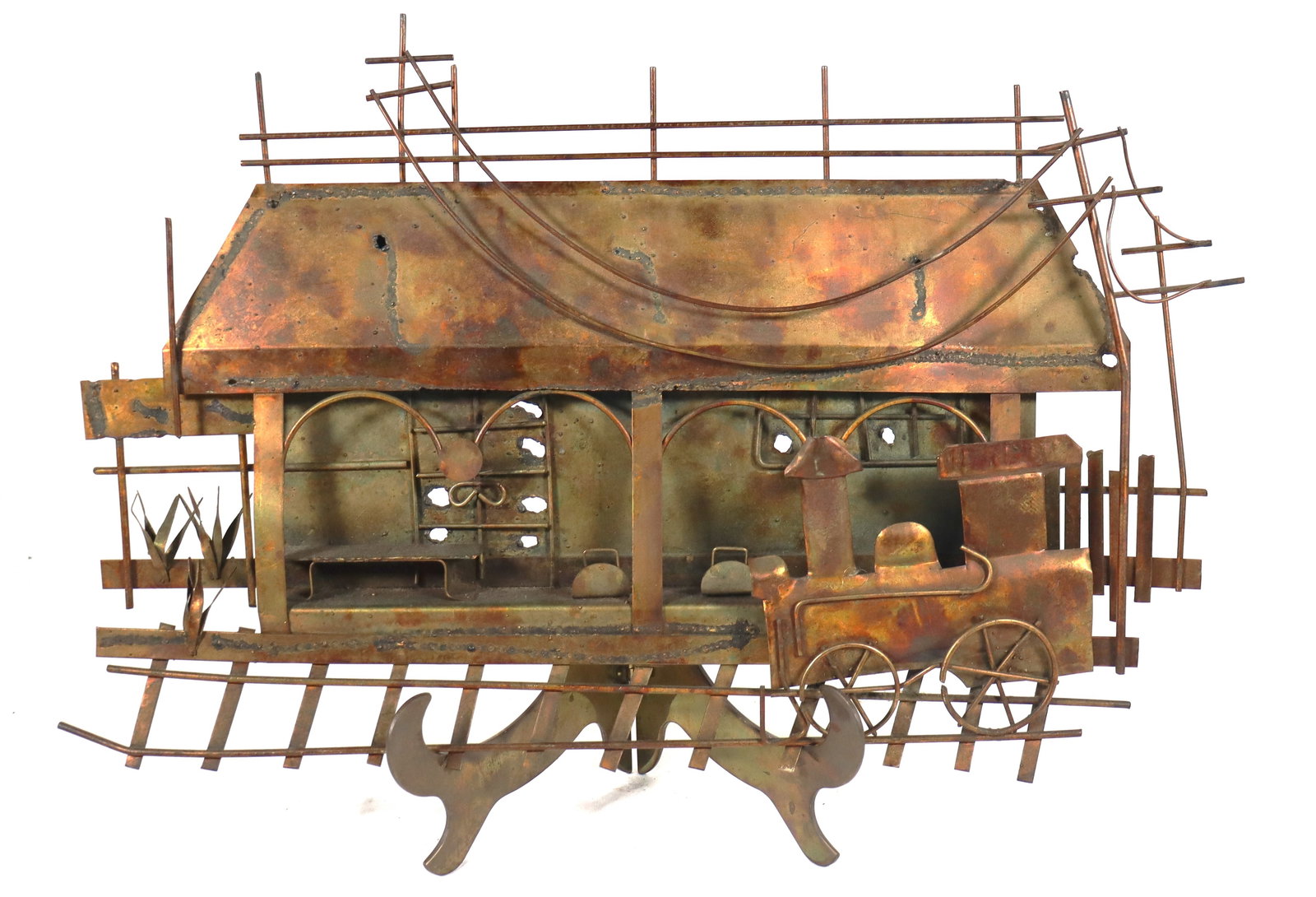 Vintage copper sculpture depicting a railroad and train station scene. (1 of 6)