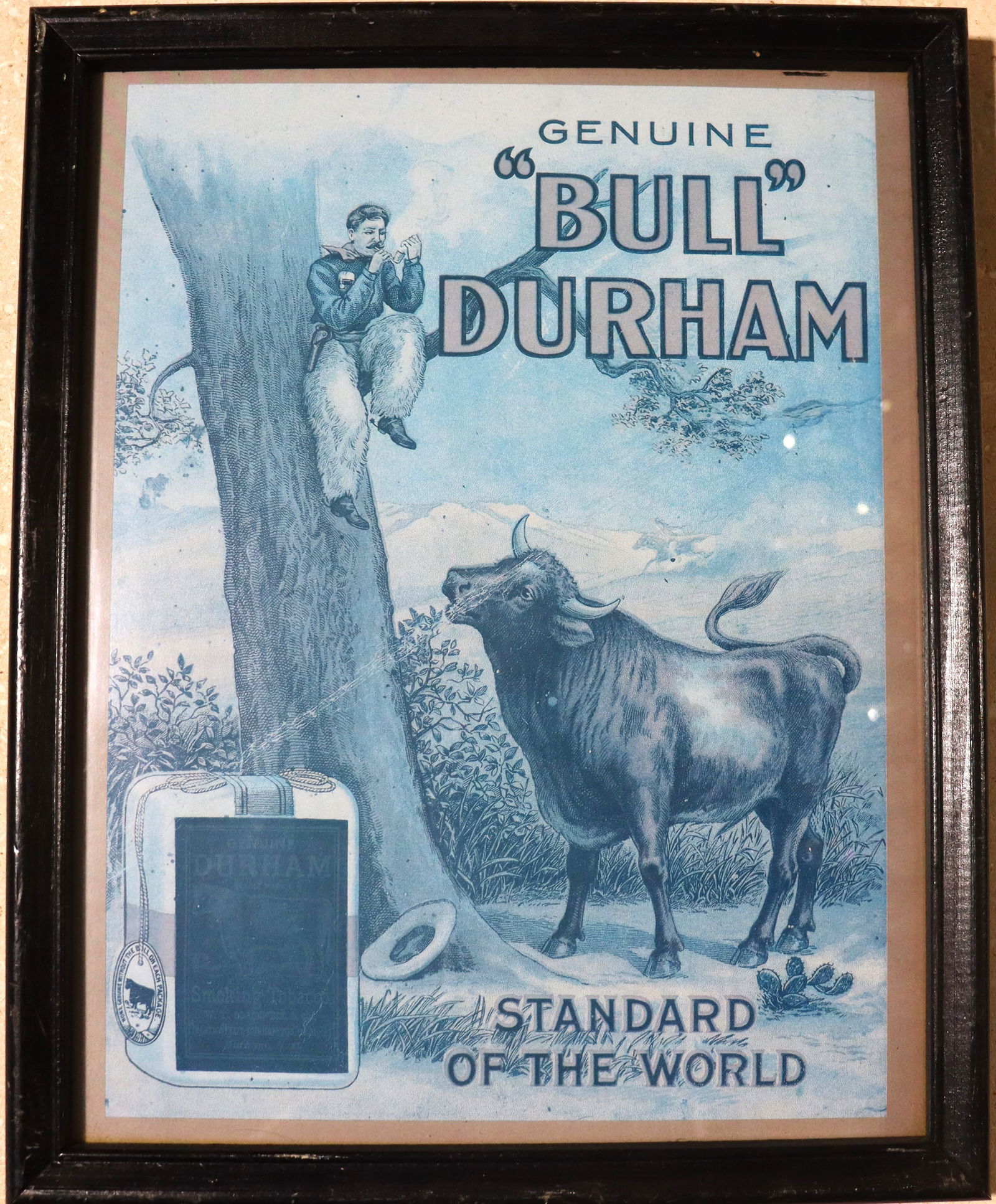 Framed Vintage Advertising for "Bull Durham" smoking tobacco: Framed Vintage Advertising for "Bull Durham" smoking tobaccoThe image is an advertisement for "Bull Durham" smoking tobacco, a brand that originated in the 1850s in Durham, North