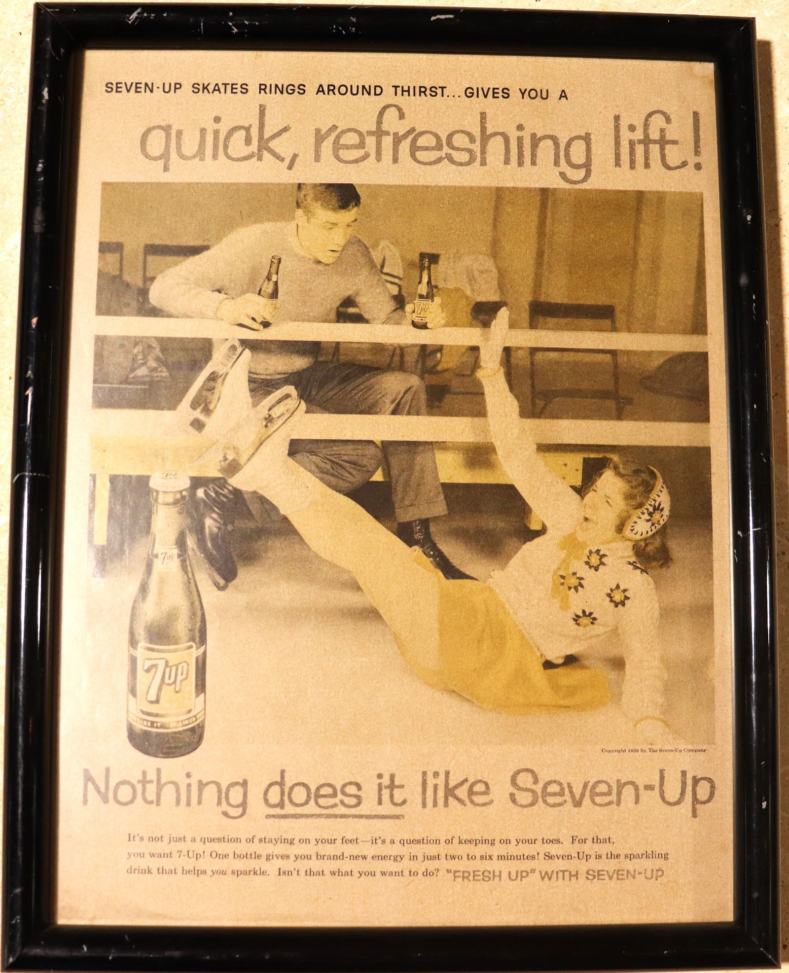 Framed Vintage Advertising of Seven-Up: Framed Vintage Advertising of Seven-Up This is a vintage Seven-Up advertisement, dating back to 1959. The ad features a scene at an ice rink with the headline "SEVEN-UP SKATES RINGS AROUND