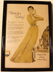 Framed Vintage Advertising of Pepsi-Cola ad titled "Portrait of a Darling!"