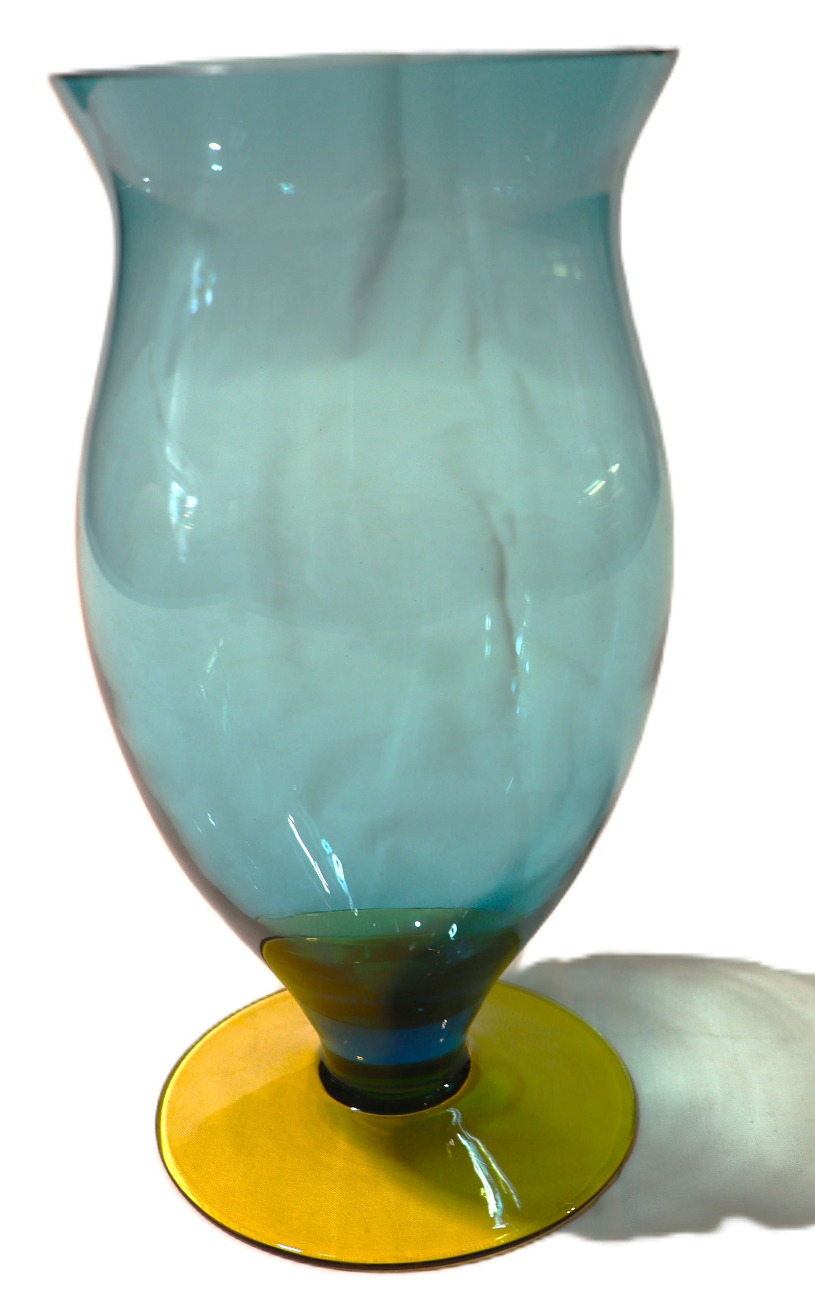 Vintage Bohemian Czech glass footed vase with a blue body and a yellow/amber base.: Vintage Bohemian Czech glass footed vase with a blue body and a yellow/amber base. DIMENSIONS: Height 9.05 inch / 23 cm 