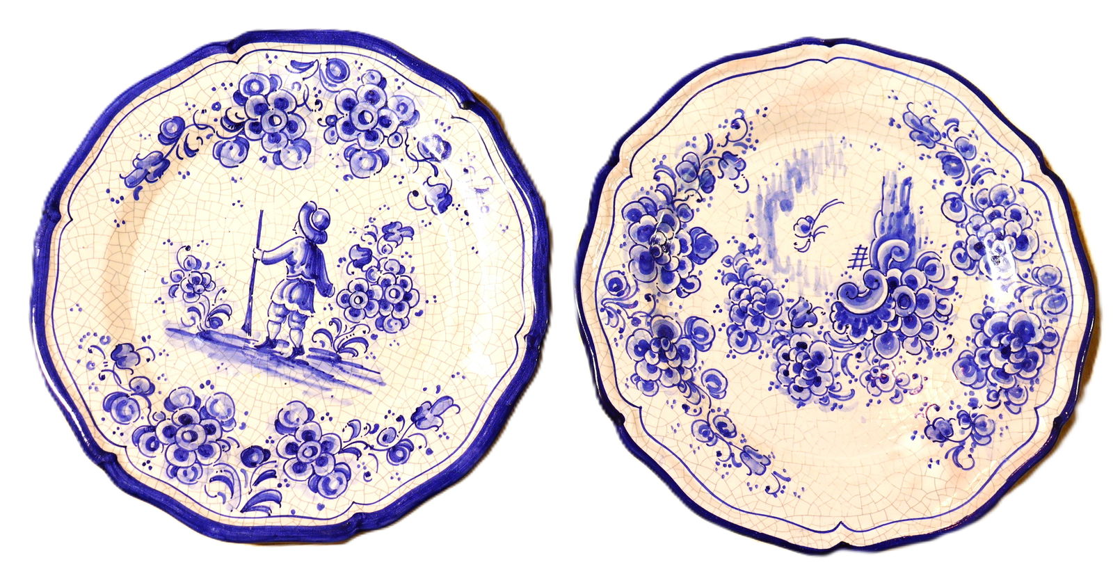 Vintage Spanish Majolica Pair of blue and white hand-painted ceramic scalloped plates by Lufeco: Vintage Spanish Majolica Pair of blue and white hand-painted ceramic scalloped plates by Lufeco Sevilla The style is characteristic of Spanish faience (Majolica) from the mid-20th century. 
