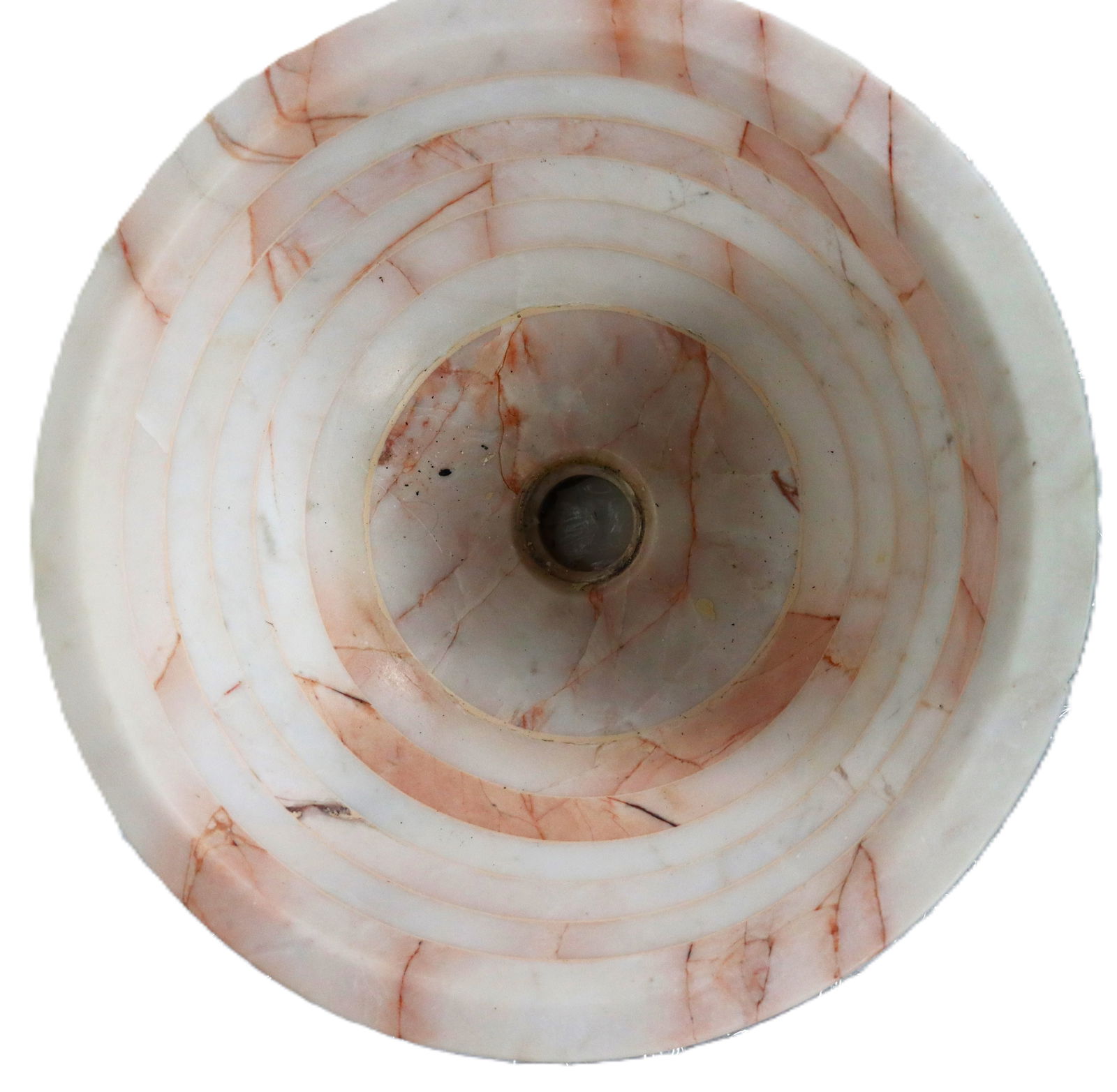 A round, handcrafted natural rose marble stone vessel sink.:  A round, handcrafted natural rose marble stone vessel sink. It is carved from a solid block of natural stone, featuring unique crystalline patterns and variations in color. The sink h