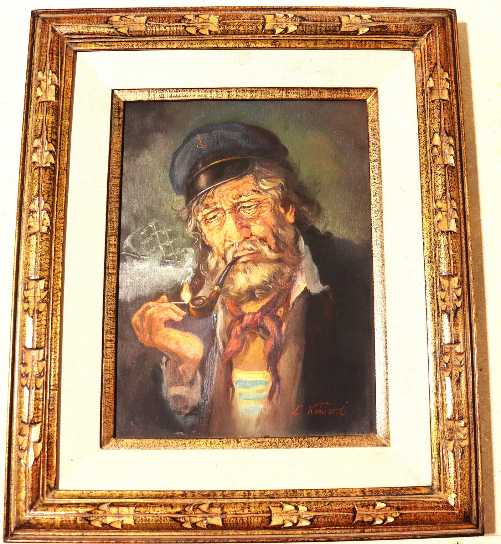 Framed Oil on Board signed Laszlo Kohanecz: Framed Oil on Board signed Laszlo Kohanecz This is an oil painting of an old man, often identified as a fisherman or sea captain, smoking a pipe. The subject is a popular one in portrait art
