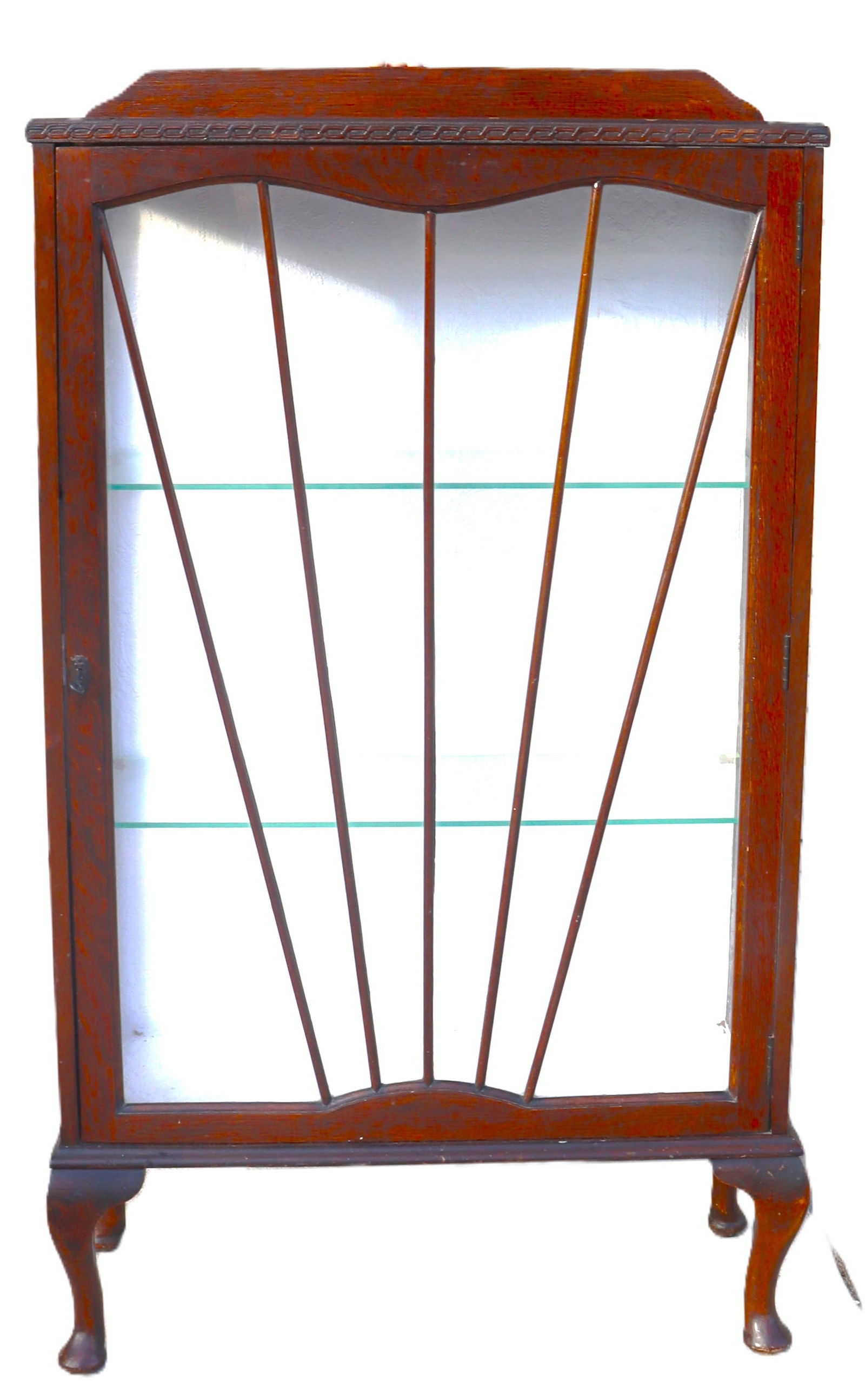 A Queen Anne style mahogany vitrine or curio cabinet.:  A Queen Anne style mahogany vitrine or curio cabinet. The cabinet features a glass front door, glass side panels, and Two glass shelves. DIMENSIONS: Height: 50 inch / 129,5 cm