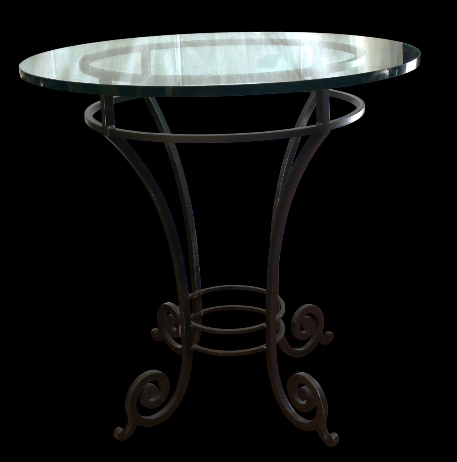 Wrought-Iron high table with Glass Top: Wrought-Iron high table with Glass Top, the base is constructed from hand-forged or wrought iron, known for its sturdiness and durability. The top is a round glass panel. DIMENSIONS: Heigh