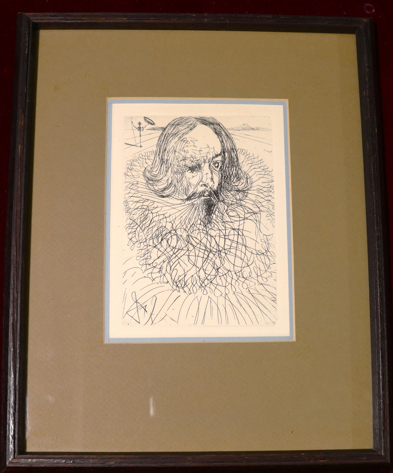 Framed etching by Salvador Dali is a portrait of Miguel de Cervantes Saavedra: Framed etching by Salvador Dali is a portrait of Miguel de Cervantes Saavedra, an influential Spanish writer from the 16th century. This piece, part of Dali's series titled "Spanish Immo