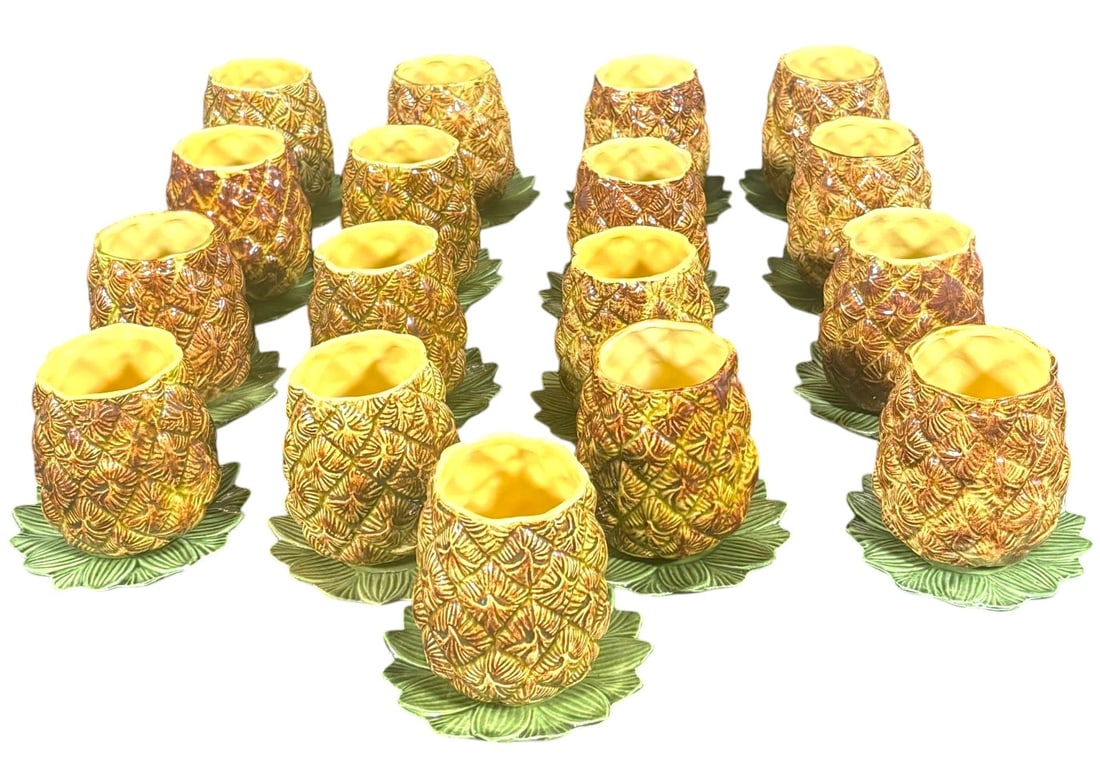 17 Hand-Made Ceramic Pineapple Goblets and 17 small pineapple plates: 17 Hand-Made Ceramic Pineapple Goblets and 17 small pineapple plates (5 with chips)DIMENSIONS plates: Diameter 4.90 inch / 12,5 cmDIMENSIONS goblets: Height: 4.05 inch /