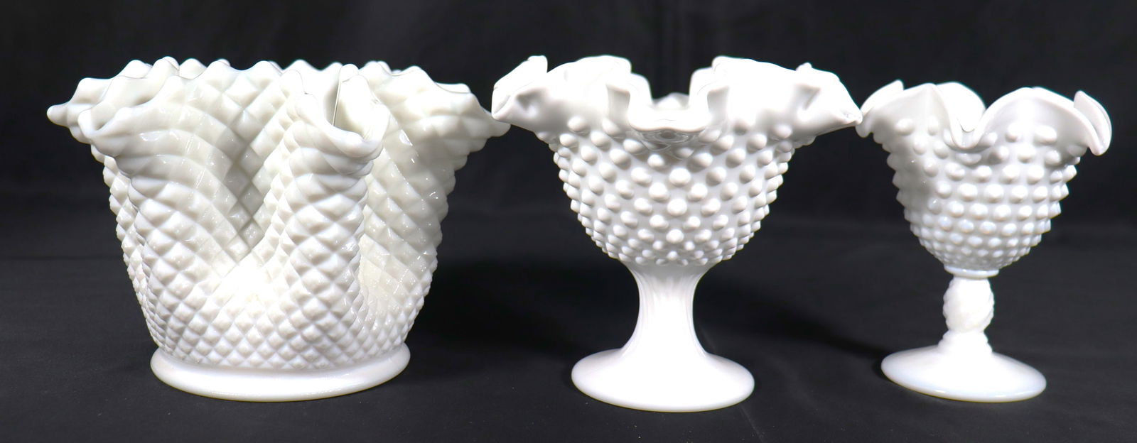 Three vintage Hobnail Milk Glass footed bowls and compotes, featuring a distinct hobnail texture and: Three vintage Hobnail Milk Glass footed bowls and compotes, featuring a distinct hobnail texture and crimped or ruffled rims. DIMENSIONS: Height: 5.50 inch / 14 cm 
