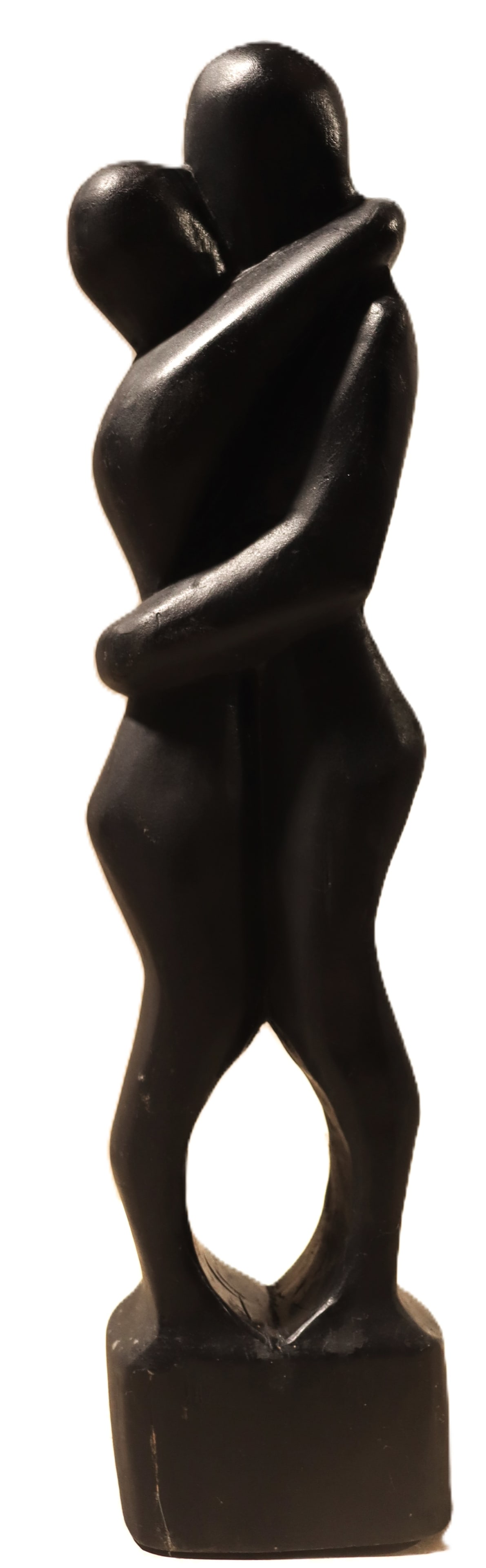 Vintage hand-carved wood abstract sculpture depicting a couple embracing.: Vintage hand-carved wood abstract sculpture depicting a couple embracing. The sculpture portrays a man and a woman in a close, loving embrace, with the abstract forms highlighting their bodies