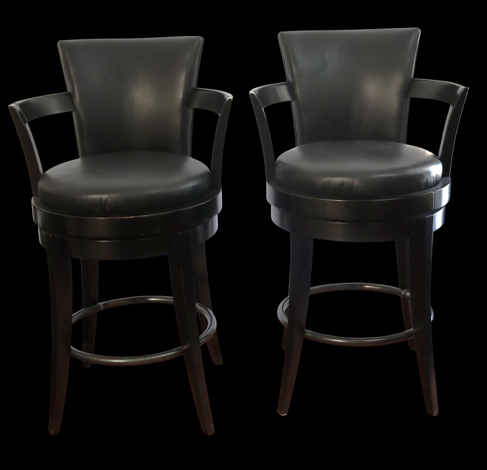 Two Swivel Bar Stools.: Two Swivel Bar Stools. Faux (or bonded) leather upholstery with a solid hardwood frame, Black upholstery with a black wood finish with swivel mechanismDIMENSIONS: Height: 44.50 inch / 113 cm 