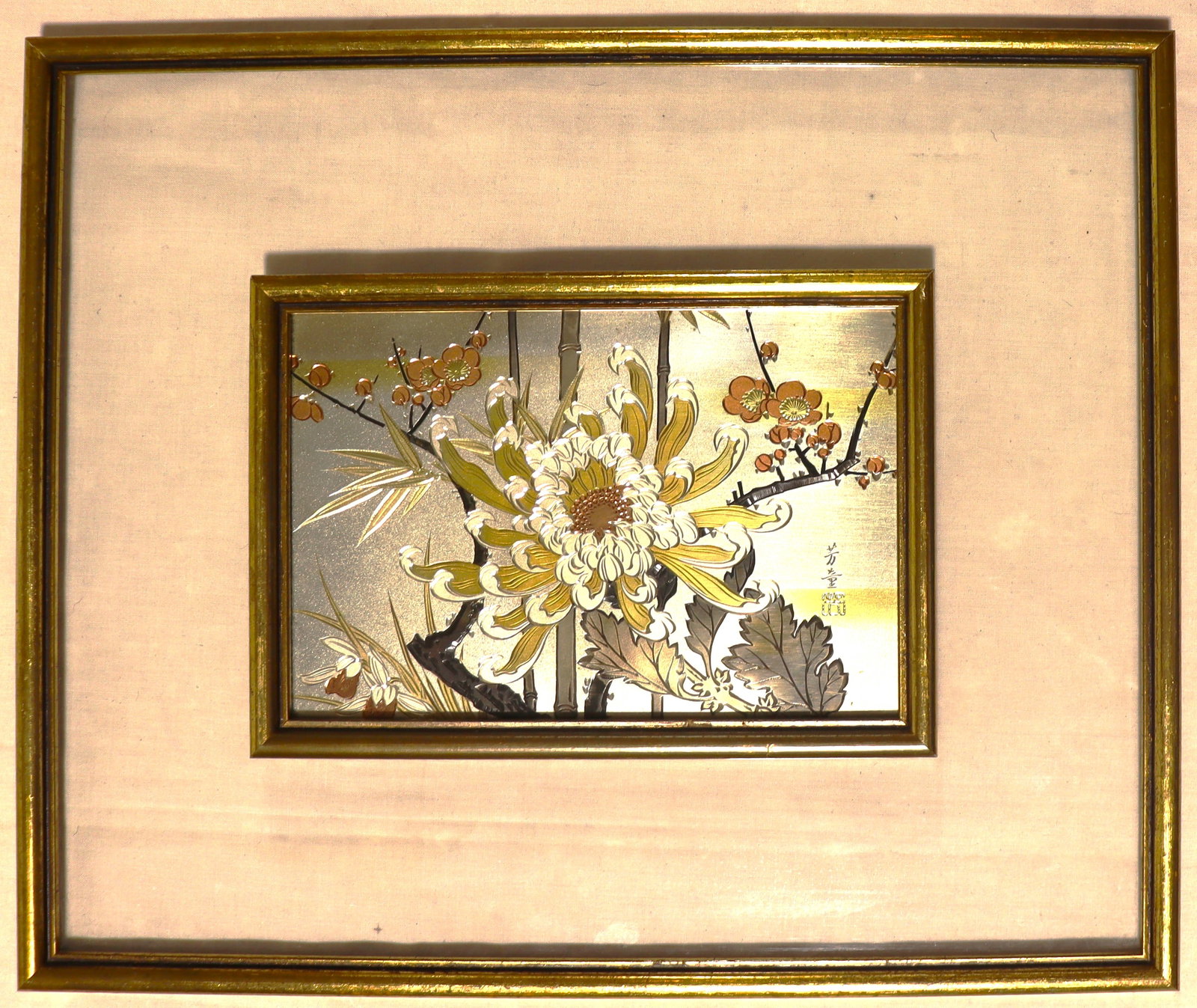 Japanese Chokin art, specifically a mixed-metal plaque featuring traditional East Asian botanical: Japanese Chokin art, specifically a mixed-metal plaque featuring traditional East Asian botanical motifs. The plaque is housed in a simple gold-colored frame and mounted on a neutral mat within a