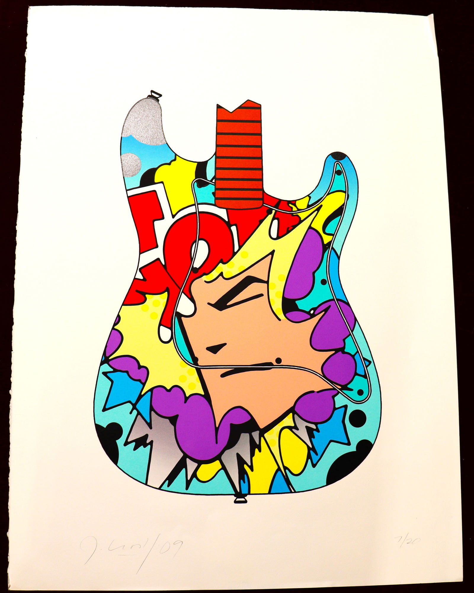 Unframed John "Crash" Matos, Lithograph, Face Guitar numbered 7/ 20 and dated 09: Unframed John "Crash" Matos, Lithograph, Face Guitar numbered 7/ 20 and dated 09John "Crash" Matos, American (b. 1961) Color Lithograph, "Face Guitar" on deckled Arches