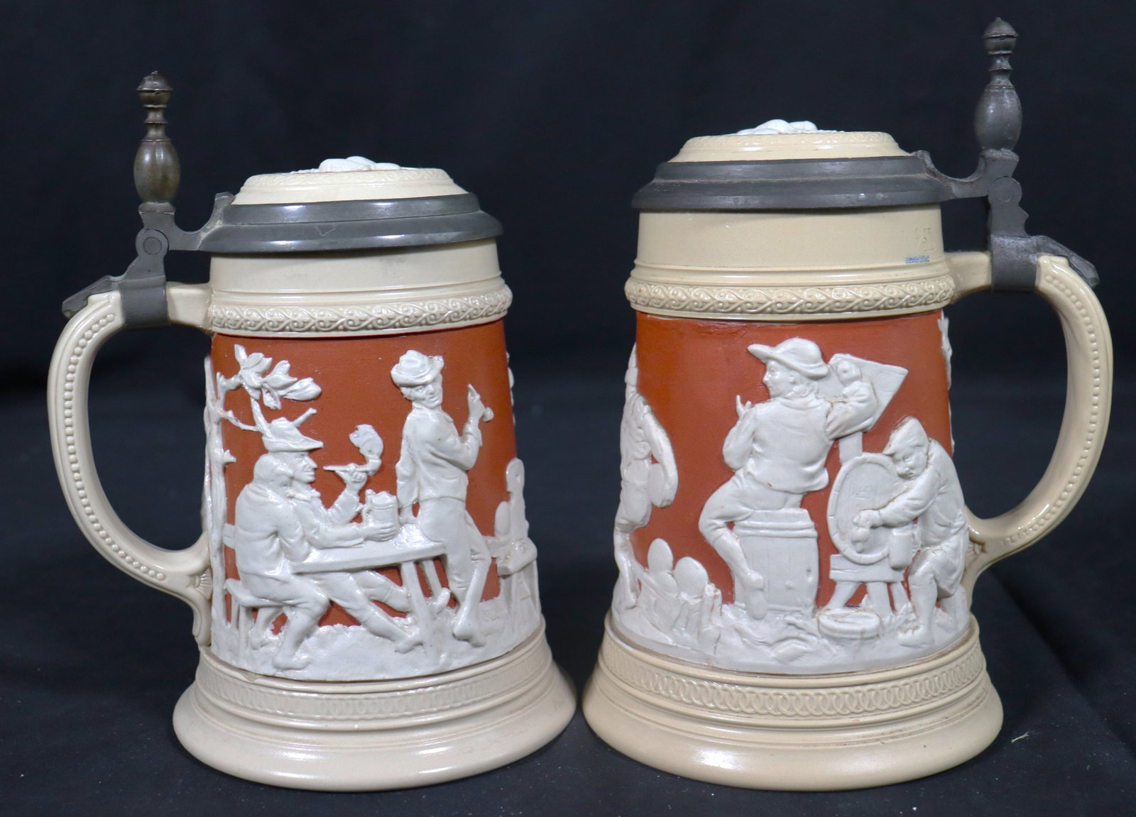 TWO Villeroy & Bosh METTLACH 2182 LIDDED STEIN.1/2 L MARKED GERMAN GERMANY: TWO Villeroy & Bosh METTLACH 2182 LIDDED STEIN.1/2 L MARKED GERMAN DIMENSIONS: Height 7 inch / 17,8 cm &nb