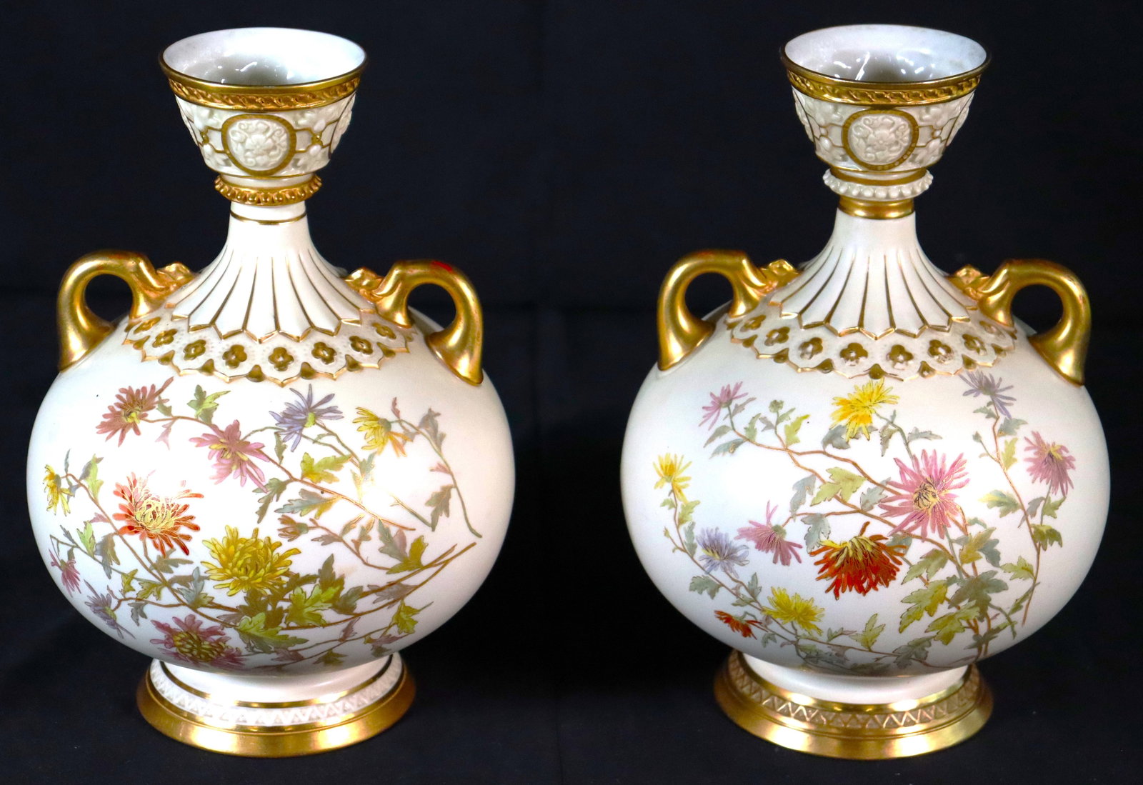 Pair of Antique Royal Worcester Bulbous Chrysanthemums Vase: Pair of Antique Royal Worcester Bulbous Chrysanthemums Vase An exquisite Pair of Royal Worcester Vase featuring a decorated body adorned with chrysanthemums, complemented by a gilt handle design and a
