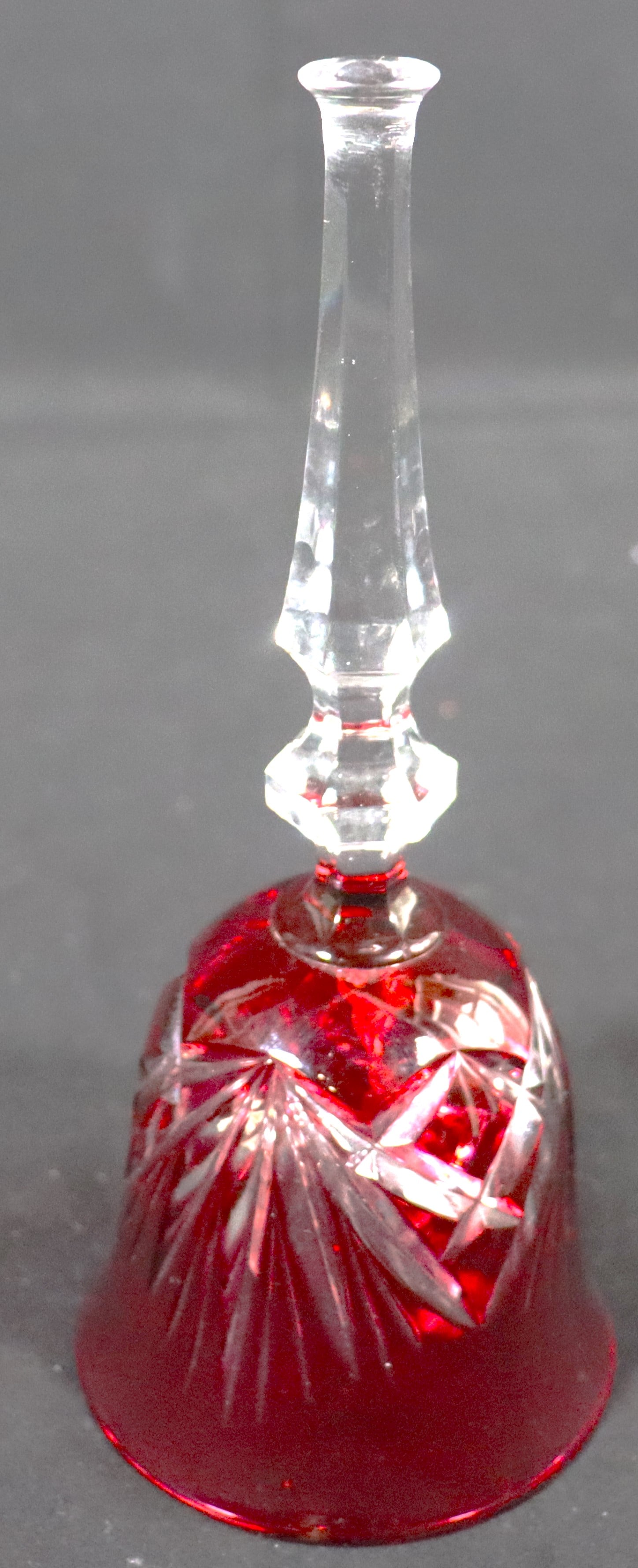 Hand Dinner Bell Cut Lead Crystal Cranberry Cut to Clear Glass:  Hand Dinner Bell Cut Lead Crystal Cranberry Cut to Clear Glass DIMENSIONS: Height 8 inch / 20,3 cm 