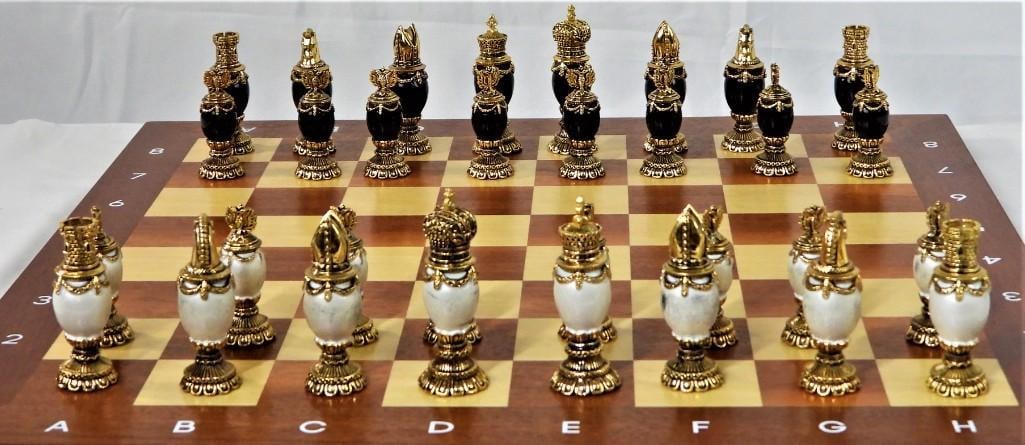 House of Fabergé Imperial Chess Set, crafted from 24kt gold-plated silver: House of Fabergé Imperial Chess Set, crafted from 24kt gold-plated silver Consisting of White and Black eggs chess set with gold plated headpieces, inspired by the jeweled eggs of Faberge