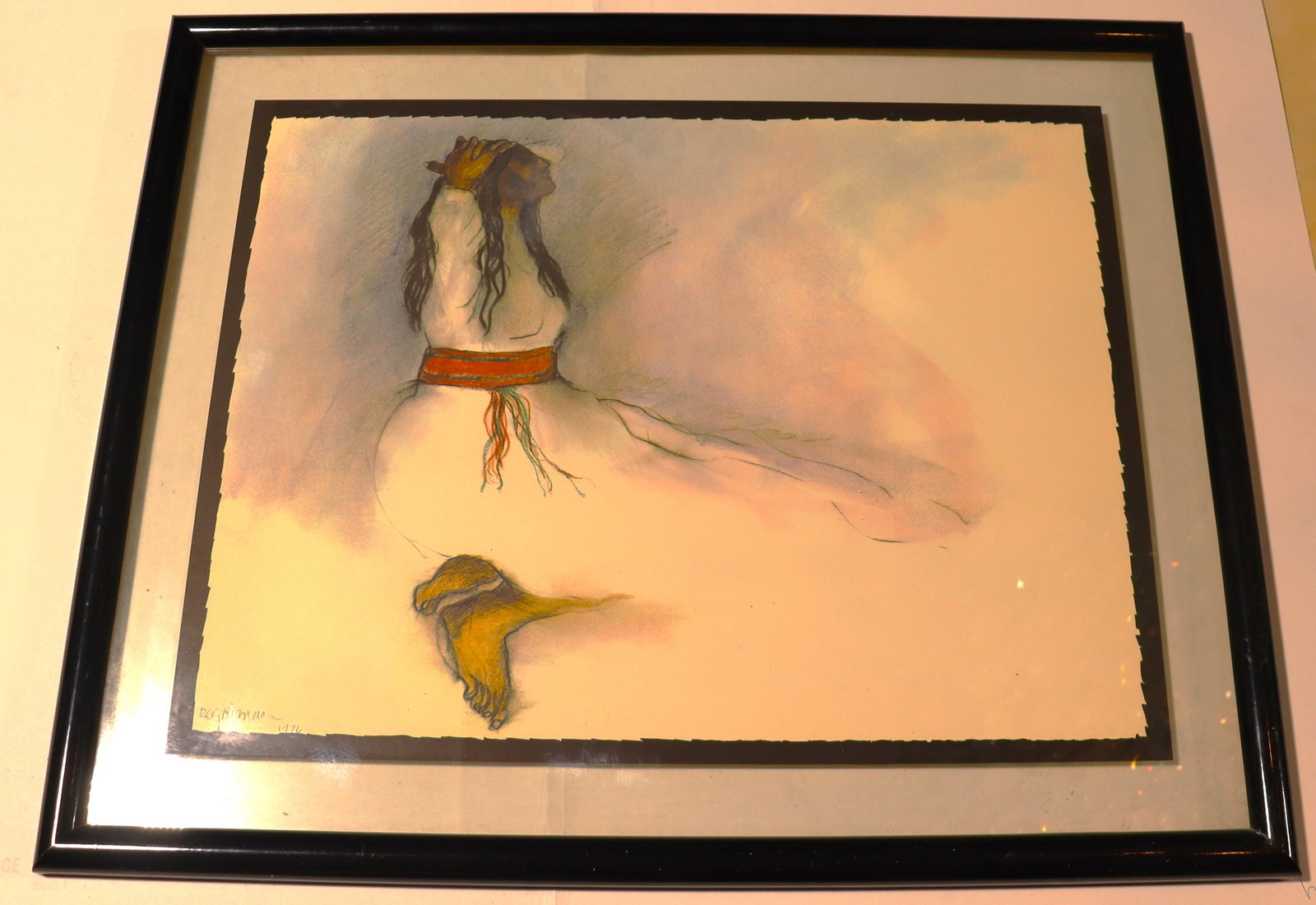 Framed lithograph on paper of R.C. Gorman's artwork, often referred to as "Indian Woman" or "Woman: Framed lithograph on paper of R.C. Gorman's artwork, often referred to as "Indian Woman" or "Woman with Red Belt". dated 1974. The artist is Rudolph Carl Gorman (1931&ndas