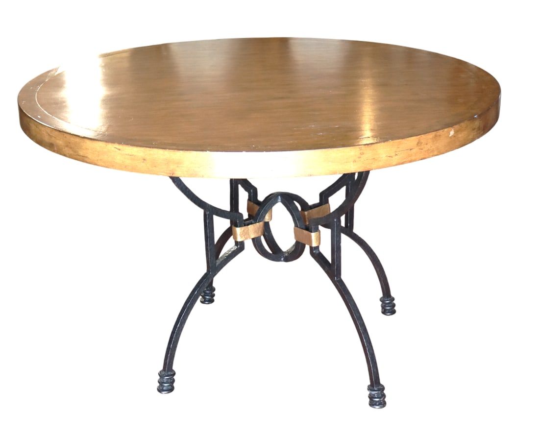 Round dining table with a black wrought iron base and wooden, top.: Round dining table with a black wrought iron base and wooden, top. DIMENSIONS: Height 30.30 inch / 77 cm 