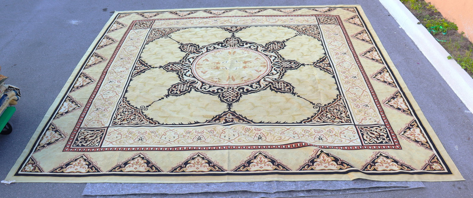 Vintage decorative area rug featuring a traditional patterned design.: Vintage decorative area rug featuring a traditional patterned design. The rug has a central medallion surrounded by repeating geometric and floral motifs. DIMENSIONS: Height: 157 inch / 309 cm