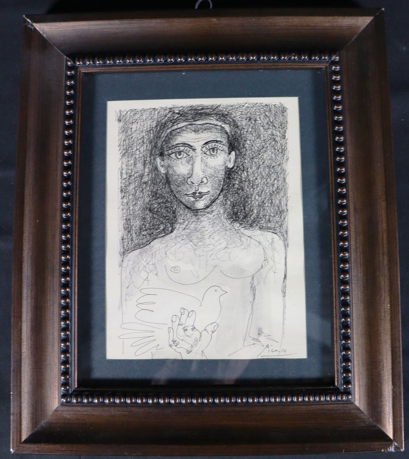 Framed Ink on paper signed Picasso lower right: Framed Ink on paper signed Picasso Pablo Picasso (Spanish/ French, 1881-1973) We do not have a COA for this piece and is therefore being sold in the manner of Picasso DIMENSIONS