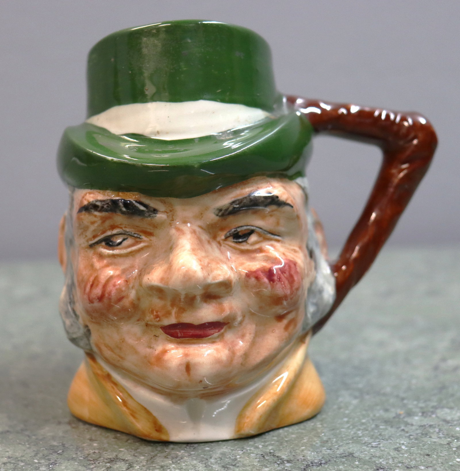 Vintage Artone England Toby Jug is a hand-painted character mug featuring a man with a green an (1 of 6)