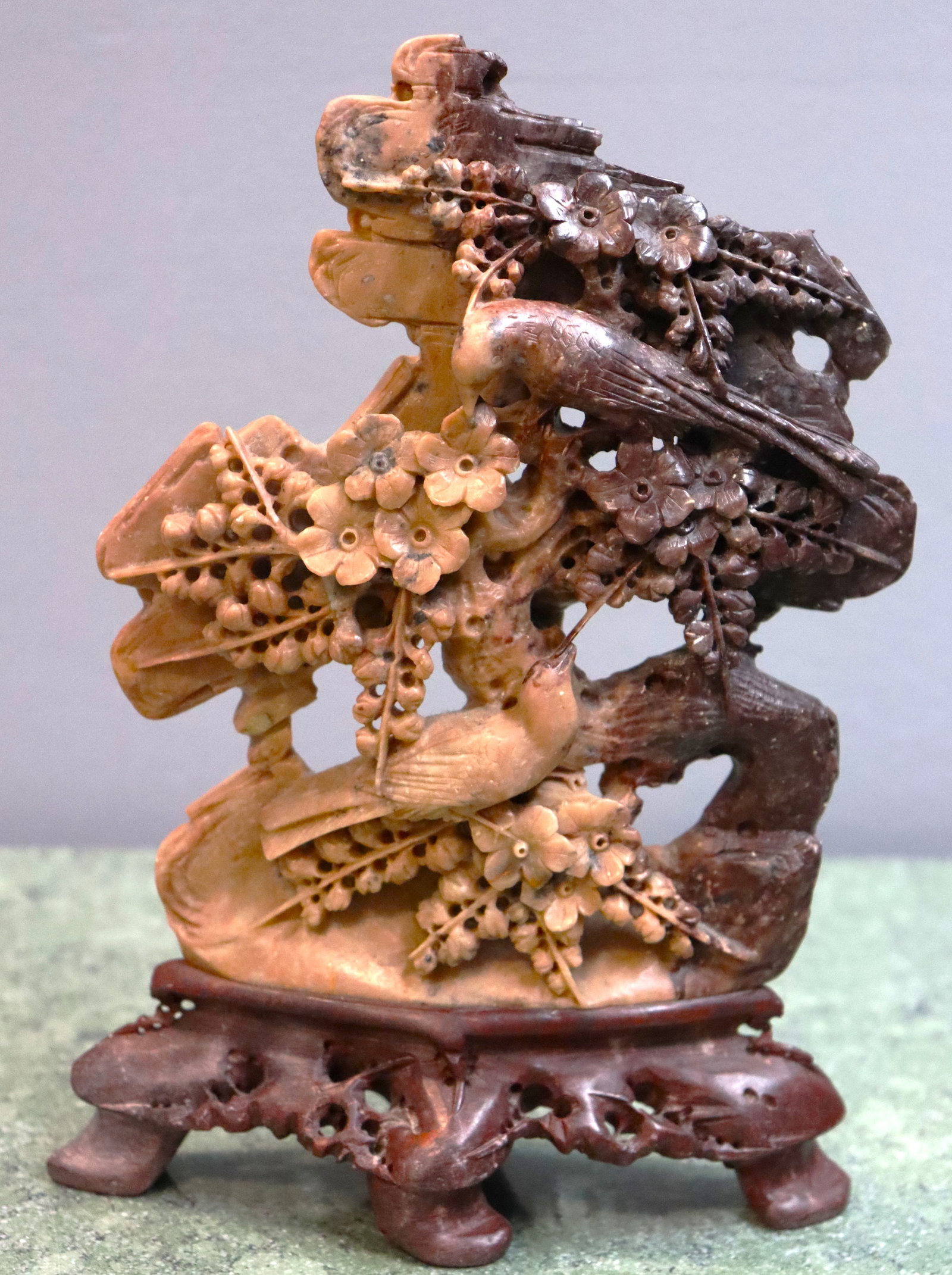 Chinese soapstone sculpture depicts birds amidst flowering branches and stands (1 of 9)