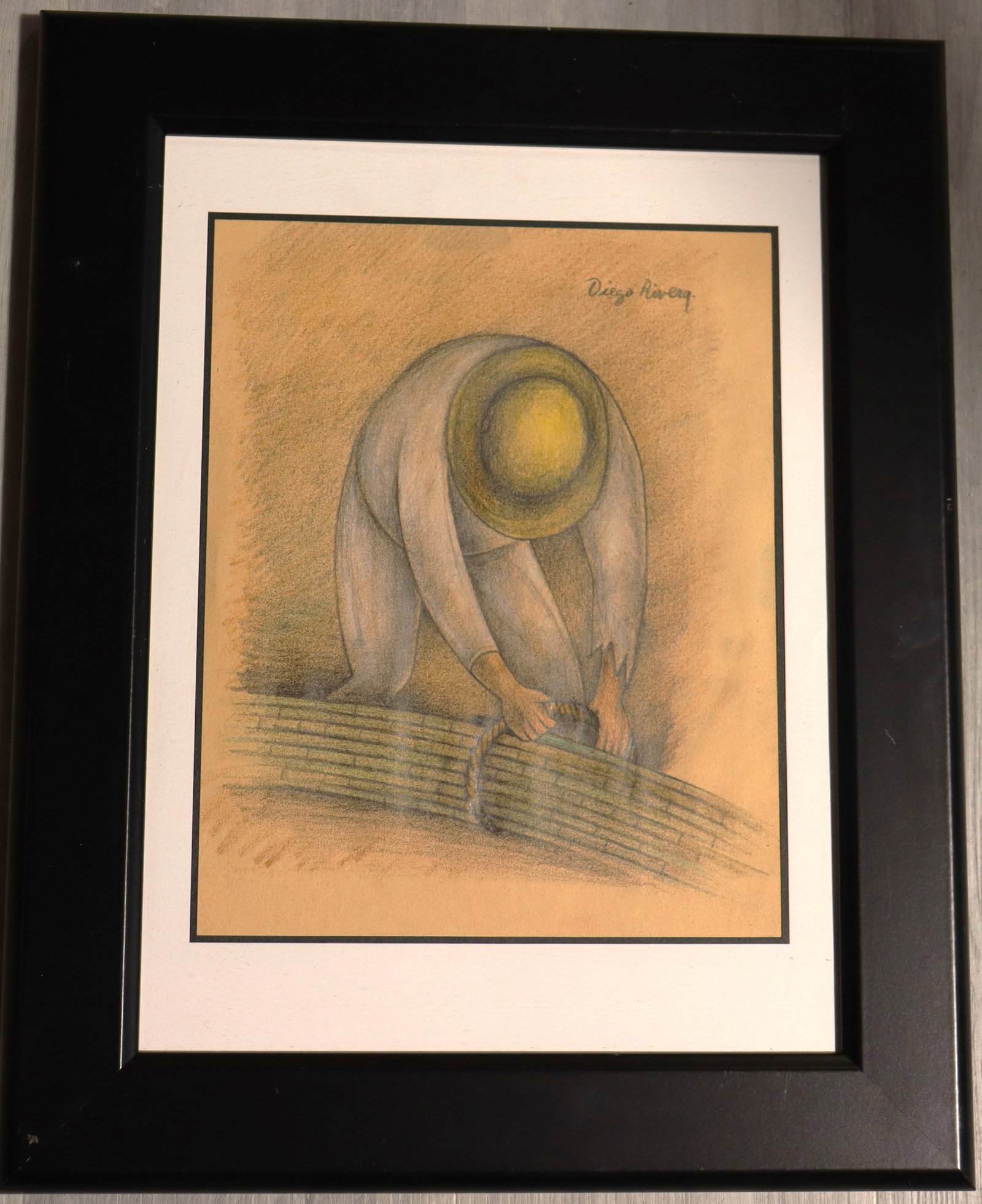 Framed Mixed Media on paper signed Diego Rivera: Framed Mixed Media on paper signed Diego Rivera, features a distinct Mexican folk-art style, characteristic of the artist's work documenting rural laborers.Diego Rivera (Mexican 1886-1957)We do not ha