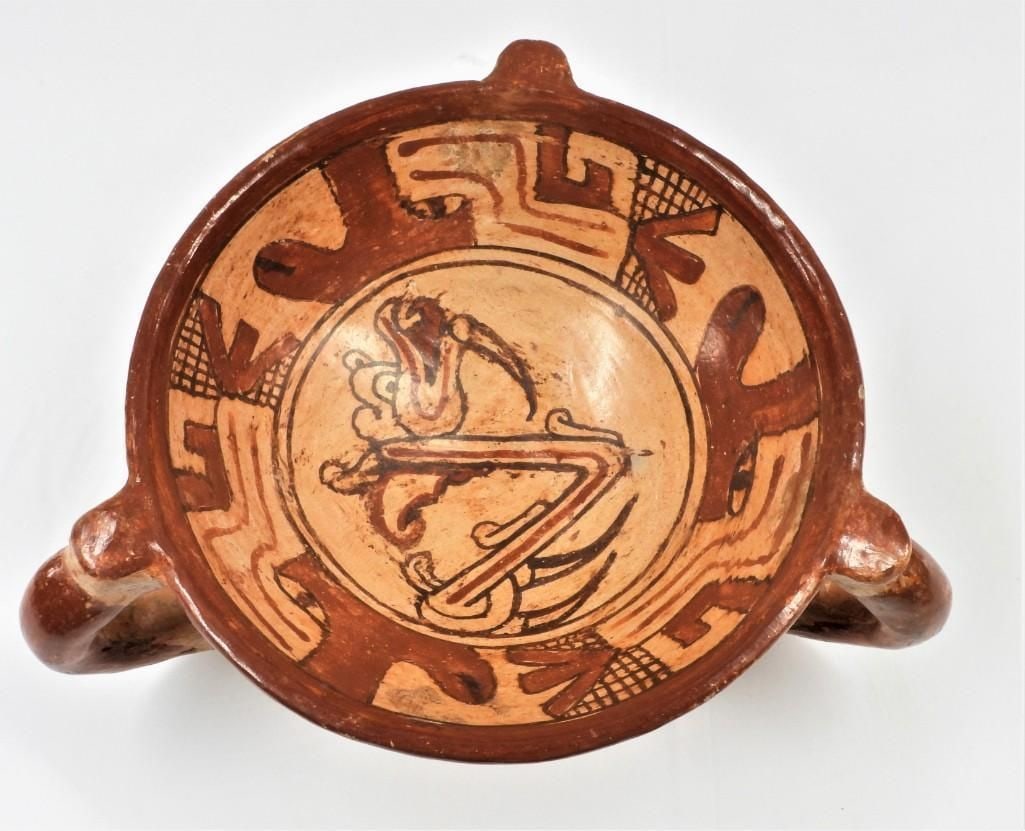 Pre-Columbian Polychrome Three-Legged Bowl, Costa: A notable Pre-Columbian polychrome three-legged bowl, identified by an accompanying label as originating from the Pacific region of Costa Rica. The bowl features a central motif depicting an avian or 