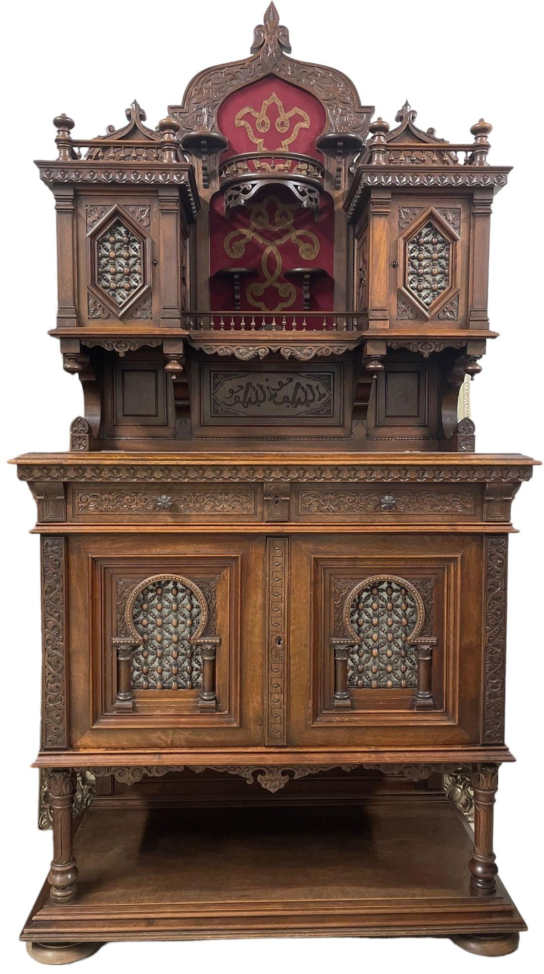 Antique 19th Century Renaissance Revival Carved W: This exquisite 19th-century sideboard, crafted in the Renaissance Revival style, features intricate carving throughout its walnut construction. The upper hutch presents a central arched niche lined wi